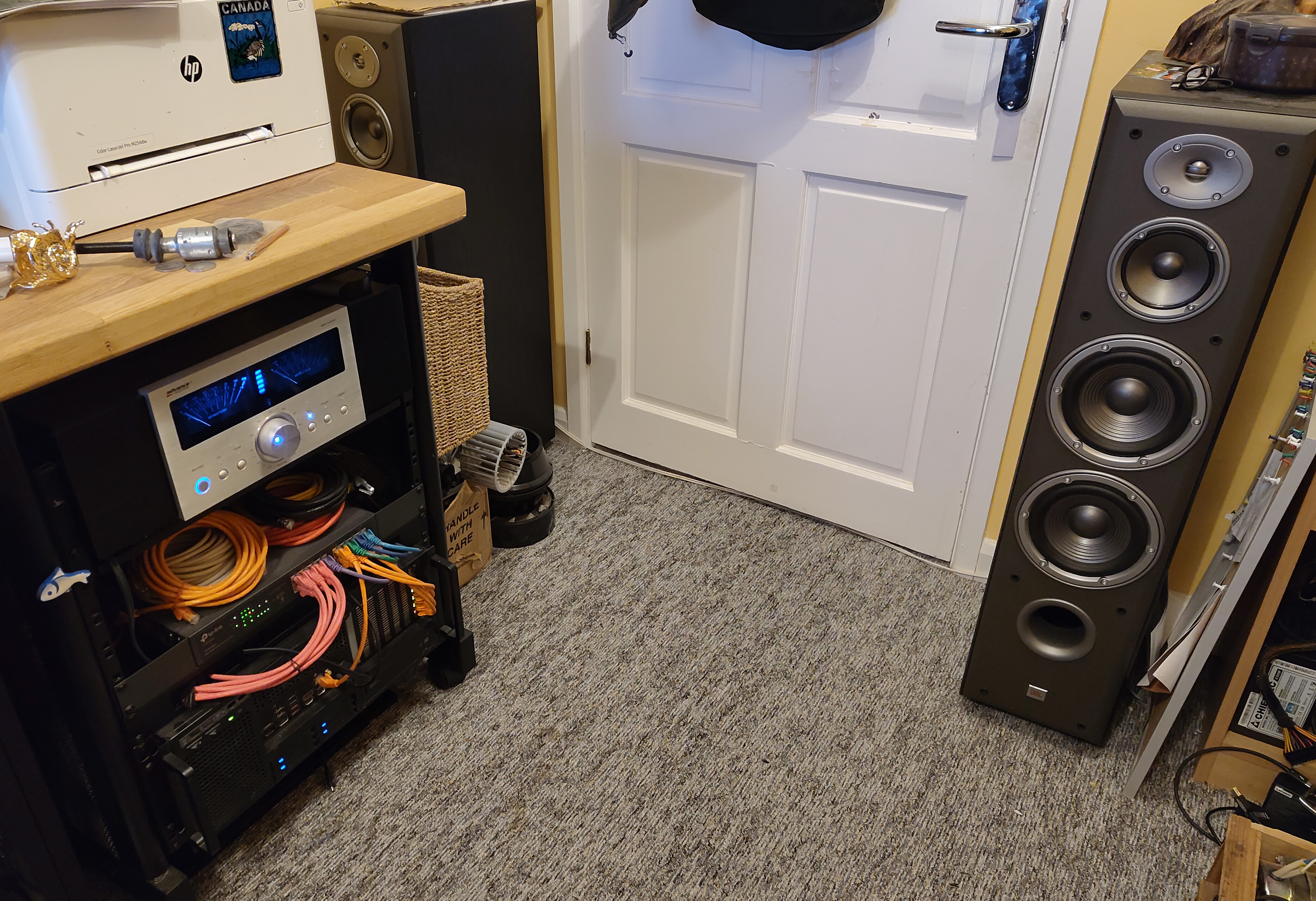 Server rack with amplifier and speakers.